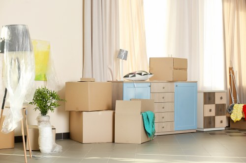 Packing services for a Barnes home move with boxes and protective wrapping