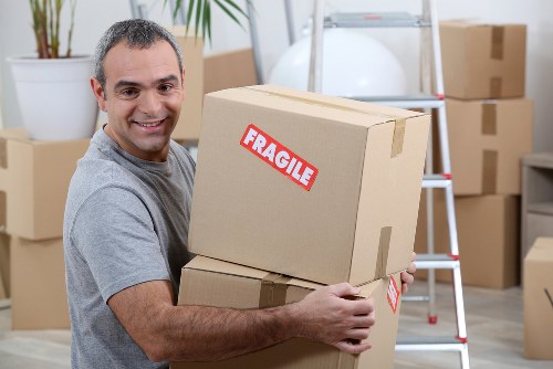 Removal team handling urgent same day move in Barnes residential street