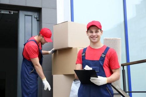 Professional movers handling furniture in Barnes