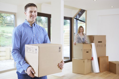 Removal team planning a house move in Barnes with boxes and furniture