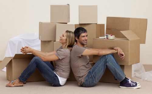 Office removal service preparing desks and equipment for transport