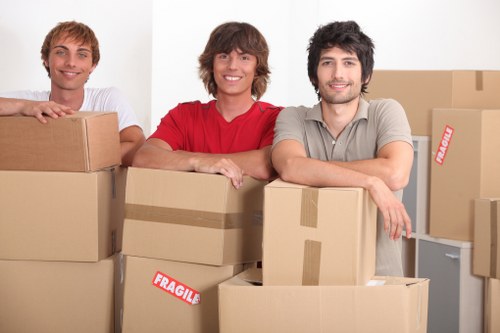 Trained movers handling furniture with care during a Barnes removal