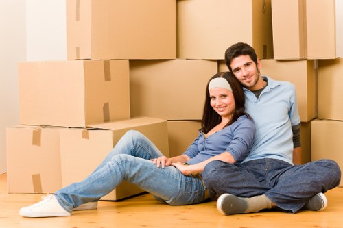 Packed moving boxes and furniture ready for local house removals in Barnes