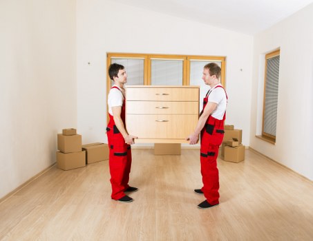 Packed boxes and furniture prepared for a local move in Barnes