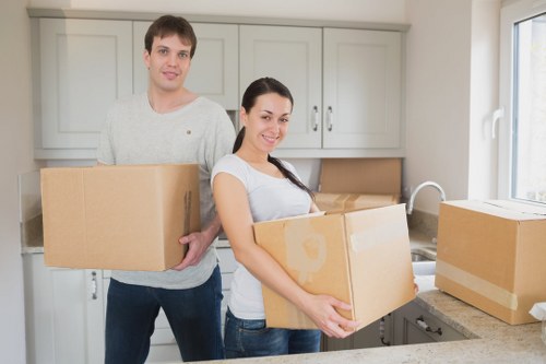 Furniture being carefully carried from a Barnes house